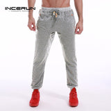 Men Pants Casual Sweatpants Bodybuliding Solid Fitness Harem Pants Slim Fit Joogers Fashion Long Sweats Trousers Sportswear 2XL